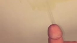 Peeing while having a hard cock 