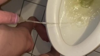 Two Trans girls peeing together standing up