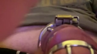 Caged sissy cumming with a vibrator 