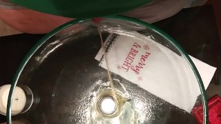 Taking a small pee in a bathroom sink while dogsitting