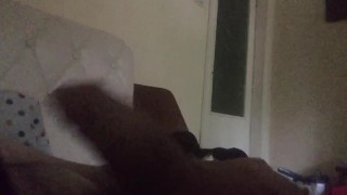 Masturbating