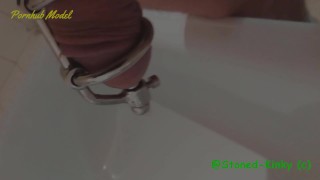 SK Urethal chastity pissing in the bathtub