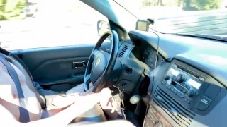 Flashing and stroking a big cock on the highway