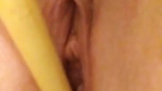 MILF masturbating with makeup brush