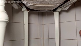 Peeing through a towel