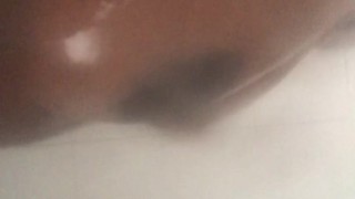 Black BBW washing her tits