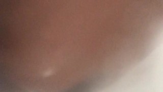 Black BBW washing her tits