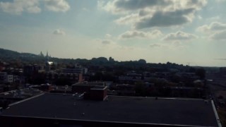 Piper flying drone on rooftop