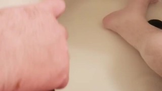 Using a cock vibrator in the bath