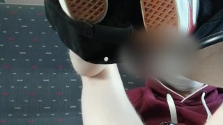 Boy in chastity plays with buttplug on the train
