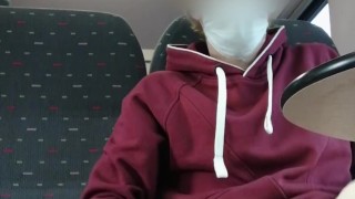Boy in chastity plays with buttplug on the train