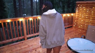 Peeing outside in the rain.