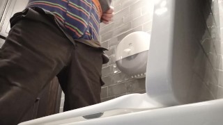  Toilet cam. Pissing in a public toilet