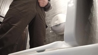  Toilet cam. Pissing in a public toilet