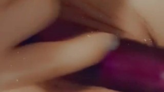 Hot, young Milf banging herself with favorite purple vibrator 