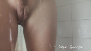 a sexy girl taking a shower