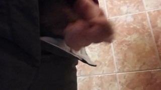 Pissing in a smelly public toilet!