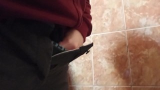 Pissing in a smelly public toilet!
