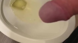Uncut cock pissing