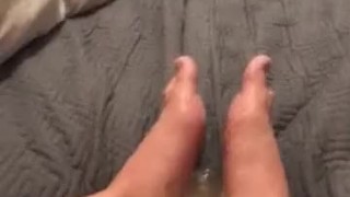 Rubbing a big cock all over my feet