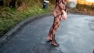 Sexy fishnet bodysuit in public