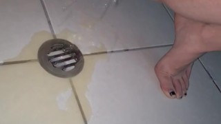 Desperate pee on bathroom floor