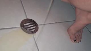 Desperate pee on bathroom floor