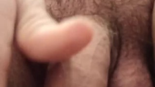 Peeing in the toilet close-up.