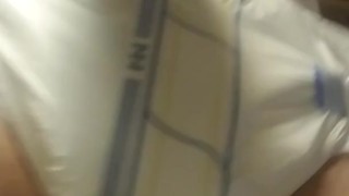 Wetting a new diaper