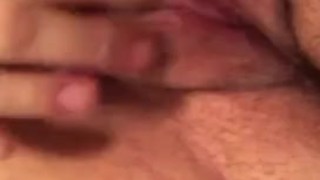 Masturbating