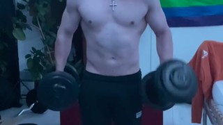 Working out at home shirtless heavy curls 