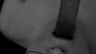 Trans girl deepthroats a foot of dildo