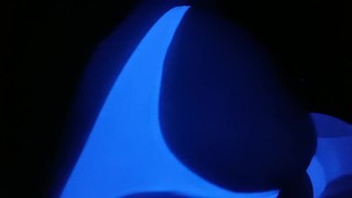 Crossdresser under UV light 