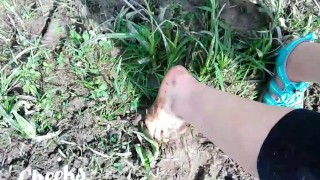 Bare feet in mud