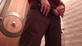 Peeing in a public fancy toilet