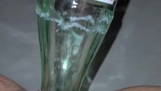 Fucking and creaming on a bottle 