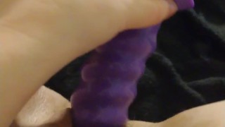 Playing with my big purple dildo