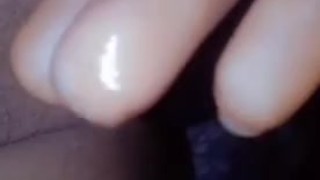 Sexy lesbian fingering her creamy pussy