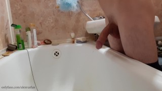 Russian teen with big dick pisses in the bathroom and cums
