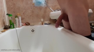 Russian teen with big dick pisses in the bathroom and cums