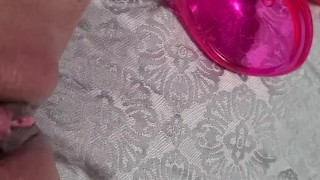Pumping up pussy and clit with pussy pump making her swell 