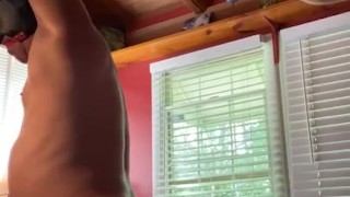 FEMDOM pegging sub with arms locked to the ceiling 