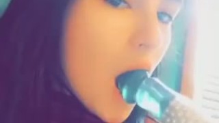 Cute  girl practicing blowjobs
