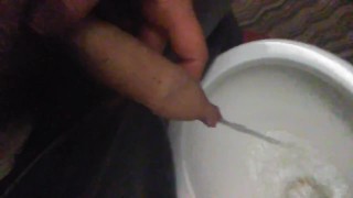 Hairy 20 y/o uncut cock pissing