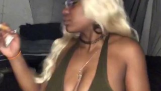 Smoking Milf teases with big tits 