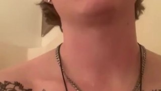Muscular guy takes shower