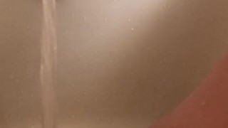 Horny hot thick MILF wiggles hips and uses bath tub faucet to get off in bathtub