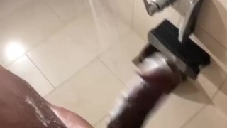 Stroking big black snake