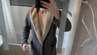 Undressing in the bathroom mirror