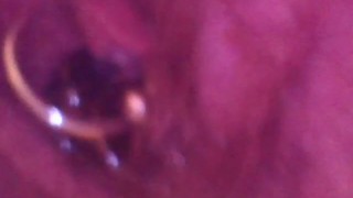Close up otoscope endoscope pee peeing urine piss pissing